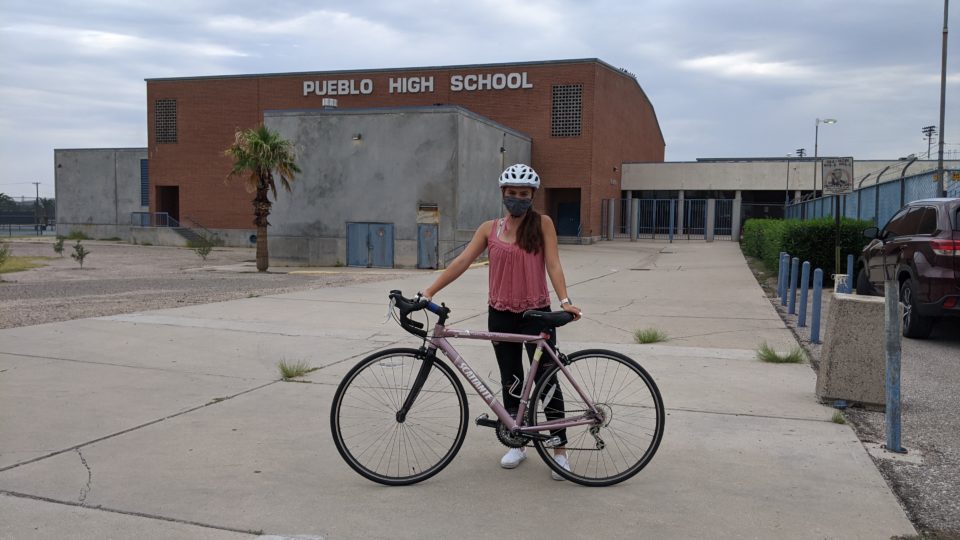 Adriana G, featured in the PtP episode, with her bike at Pueblo High 